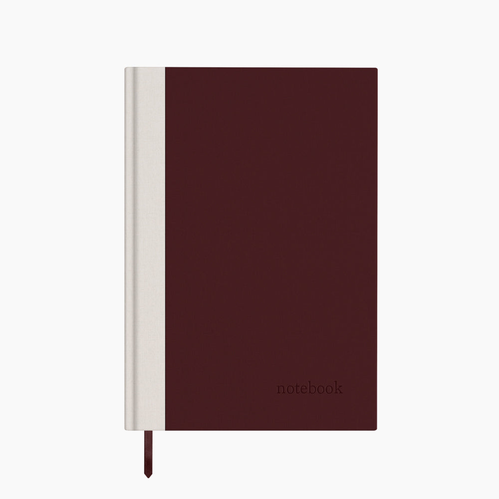 Bordowy notes w kropki